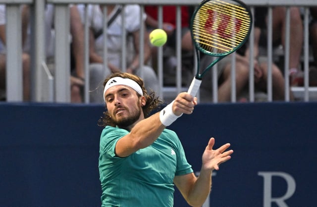 Jul 30, 2025; Toronto, ON, Canada;  Stefanos Tsitsipas (GRE) plays a shot against Christopher O'Connell (AUS) during second round play at Sobeys Stadium. Mandatory Credit: Dan Hamilton-Imagn Images/File Photo