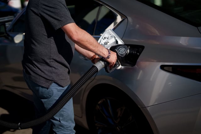 A driver refuels their vehicle in Los Angeles, California, US, on Tuesday, Aug. 28, 2025.
