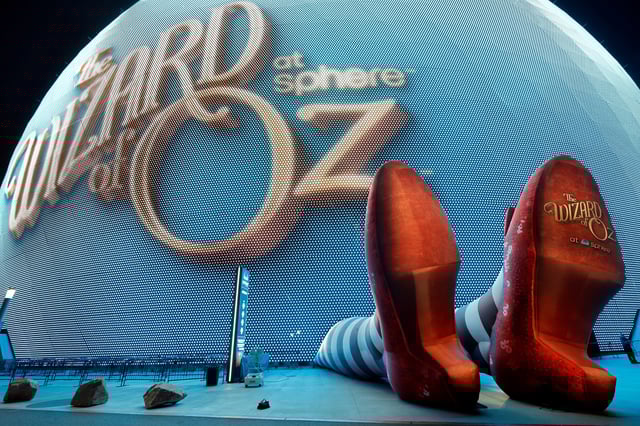 A display of 50-feet-long legs and 22-feet-tall ruby slippers, a promotion for the upcoming "Wizard of Oz at Sphere" movie, in Las Vegas, Nevada, U.S., August 20, 2025.  REUTERS/Steve Marcus/File Photo