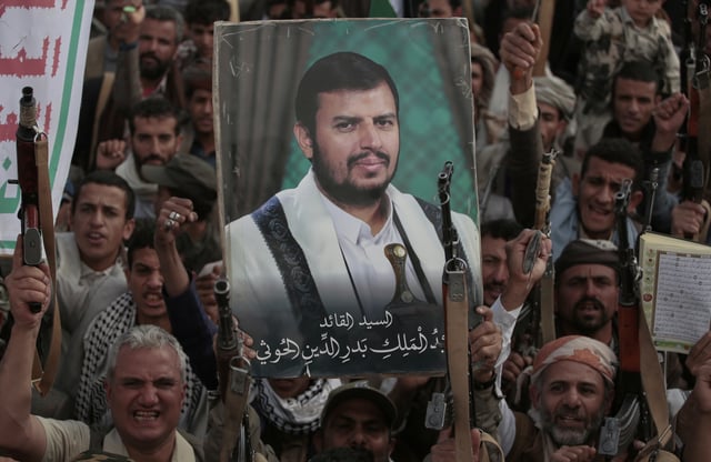 Houthi supporters chant slogans and hold pictures of Abdul Malik al-Houthi, the leader of the Houthi movement, during an anti-U.S. and anti-Israel rally in Sanaa, Yemen, Monday, March 17, 2025.