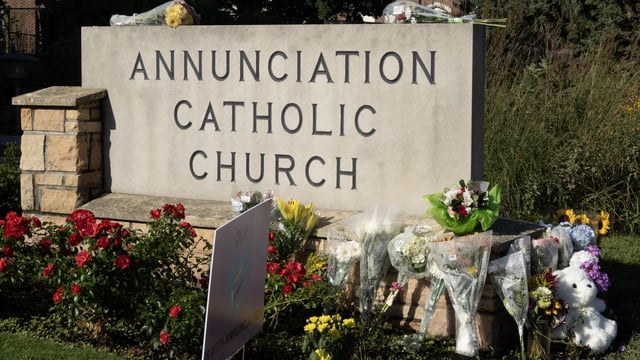 A memorial to yesterday’s shooting victims sits in front of Annunciation Catholic Church on August 28, 2025 in Minneapolis, Minnesota. A gunman fired through the windows of the church while students were sitting in pews during a Catholic school Mass, killing two children and injuring at least 17 others. The gunman reportedly died at the scene from a self-inflicted gunshot wound, according to police.