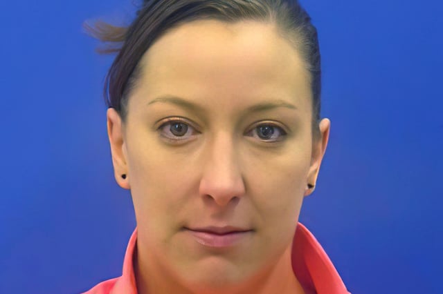 This driver's license photo from the Maryland Motor Vehicle Administration (MVA), provided to AP by the Calvert County Sheriff's Office, shows Ashli Babbitt.