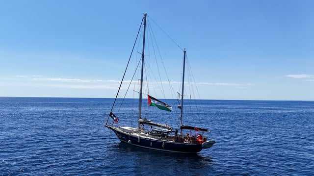 A drone view shows the Gaza-bound aid ship Madleen, organized by the international NGO Freedom Flotilla Coalition, anchored off the coast of Catania, Italy, on June 1, 2025. REUTERS/Danilo Arnone/File Photo