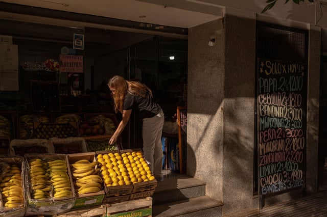 A shopper browses produce at a grocery store in Buenos Aires in March 2024.
