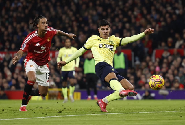 Soccer Football - Premier League - Manchester United v Southampton - Old Trafford, Manchester, Britain - January 16, 2025 Southampton's Mateus Fernandes in action with Manchester United's Leny Yoro Action Images via Reuters/Jason Cairnduff/File Photo