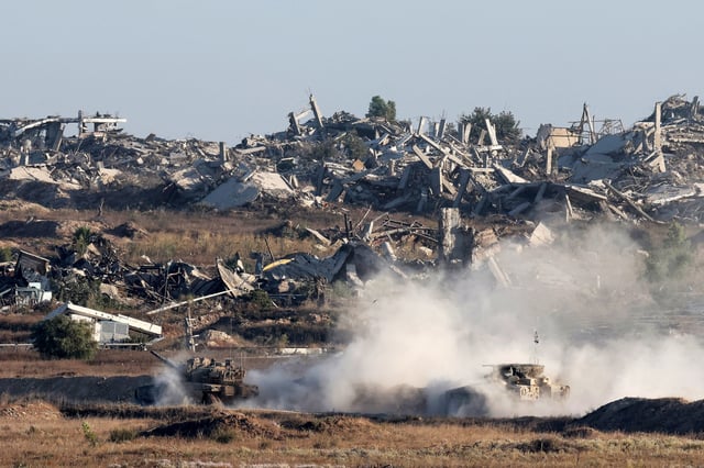 Israeli army vehicles deploy into northern Gaza on Aug. 29, 2025.