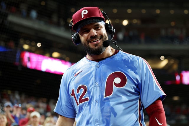 PHILADELPHIA, PENNSYLVANIA - AUGUST 28: Kyle Schwarber #12 of the Philadelphia Phillies smiles during his post game interview after a 19-4 win over the Atlanta Braves at Citizens Bank Park on August 28, 2025 in Philadelphia, Pennsylvania. Kyle Schwarber hit four home runs during the game.
