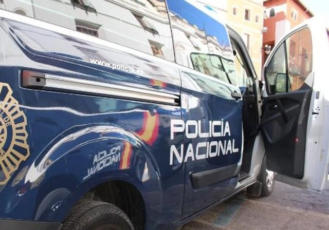 Patrullero de la Policía Nacional, en una actuación en la vía pública