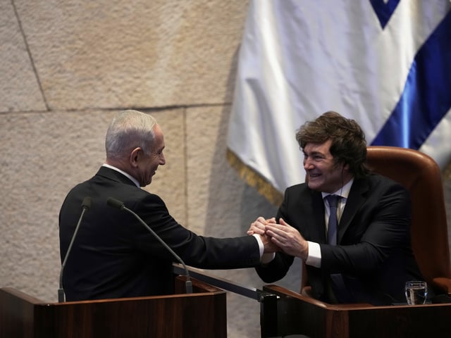 FILE - Israel's Prime Minister Benjamin Netanyahu, left, greets Argentina's President Javier Milei in the Knesset, Israel's parliament, in Jerusalem, Wednesday, June 11, 2025. (AP Photo/Ohad Zwigenberg, File)