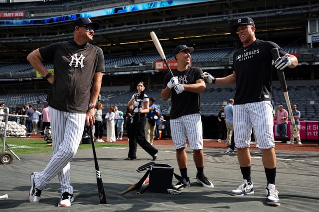 NEW YORK, NY - JUNE 20: Aaron Boone #17, Anthony Volpe #11, and Aaron Judge #99 of the New York Yankees talk during batting practice before the game against the Baltimore Orioles at Yankee Stadium on June 20, 2025 in New York, New York.
