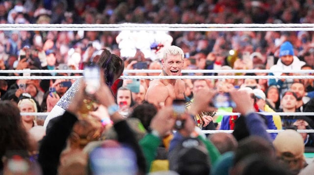 Apr 7, 2024; Philadelphia, PA, USA; WWE Universal Championship match between Roman Reigns and Cody Rhodes during Wrestlemania XL Sunday at Lincoln Financial Field. Mandatory Credit: Joe Camporeale-Imagn Images.