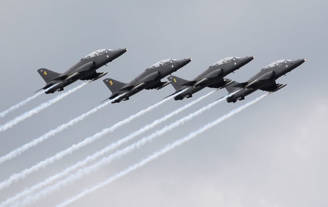 FILE - Finnish aerobatics group Midnight Hawks performs during a celebration marking the Russian air force's 100th anniversary in Zhukovsky, outside Moscow, Russia, on Aug. 11, 2012. (AP Photo/Misha Japaridze, File)