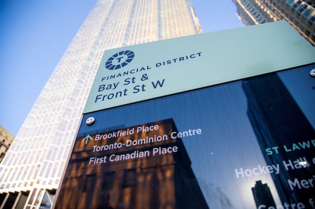 A sign in the financial district in Toronto, Ontario, Canada December 13, 2021.  REUTERS/Carlos Osorio/File Photo