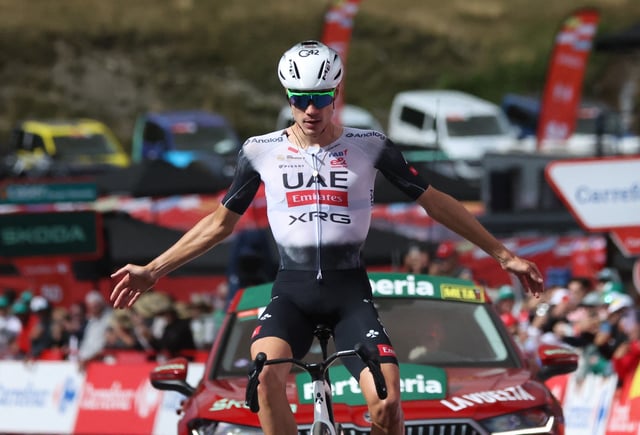 Cycling - Vuelta a Espana - Stage 7 - Andorra la Vella to Cerler - Andorra la Vella, Andorra - August 29, 2025 UAE Team Emirates XRG's Juan Ayuso celebrates winning stage 7 REUTERS/Bruna Casas