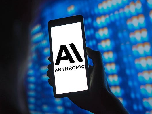 The Anthropic logo is displayed on a smartphone screen.