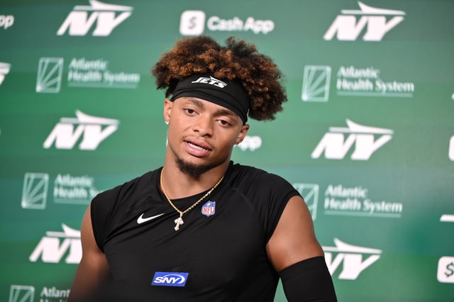 Jun 11, 2025; Florham Park, NY, USA; New York Jets quarterback Justin Fields (7) speaks at a press conference during minicamp at Atlantic Health Jets Training Center. Mandatory Credit: John Jones-Imagn Images