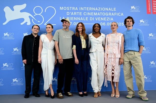 Michael Stuhlbarg, Nora Garrett, Luca Guadagnino, Julia Roberts, Ayo Edebiri, Chloe Sevigny and Andrew Garfield attend the photocall of the movie "After the Hunt" presented out of competition at the 82nd International Venice Film Festival, at Venice Lido on Aug. 29, 2025.