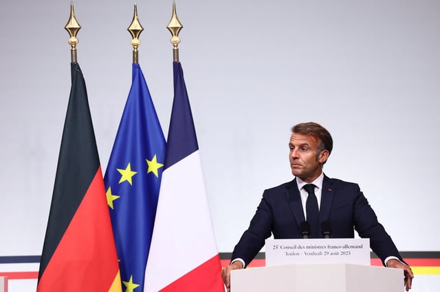 French President Emmanuel Macron speaks during a joint news conference with German Chancellor Friedrich Merz (not seen) as part of a Franco-German cabinet meeting and a meeting of the Franco-German Defence and Security Council (CFADS) in Toulon, France, August 29, 2025. REUTERS/Manon Cruz/Pool