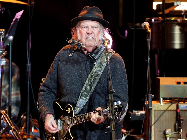 LOS ANGELES, CALIFORNIA - APRIL 26: Neil Young performs onstage during the Light Up The Blues 7 Concert celebrating Autism Speaks' 20th Anniversary at the Greek Theatre on April 26, 2025 in Los Angeles, California. (Photo by Kevin Winter/Getty Images)