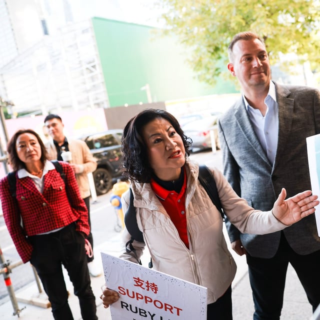 Billionaire Ruby Liu speaks with media as she arrives at court in Toronto on Friday, August 29, 2025.  (Cole Burston/The Globe and Mail)