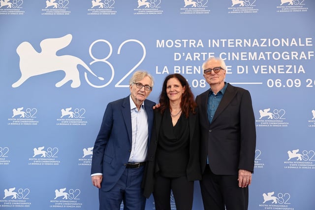 Director Laura Poitras, director Mark Obenhaus and journalist and political writer Seymour Hersh pose during a photocall for the movie "Cover Up" out of competition, at the 82nd Venice International Film Festival, Venice, Italy, August 29, 2025. REUTERS/Yara Nardi