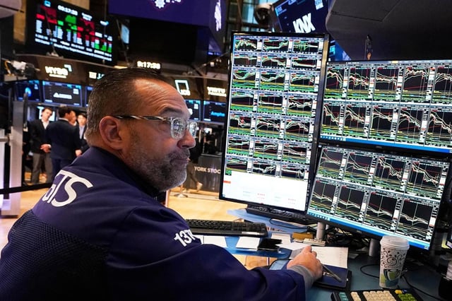 Specialist Anthony Matesic works on the floor of the New York Stock Exchange, Tuesday, May 6, 2025. (AP Photo/Richard Drew)