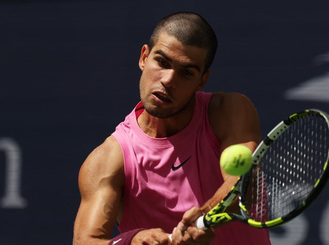 Tennis - U.S. Open - Flushing Meadows, New York, United States - August 29, 2025 Spain's Carlos Alcaraz in action during his third round match against Italy's Luciano Darderi REUTERS/Brendan Mcdermid