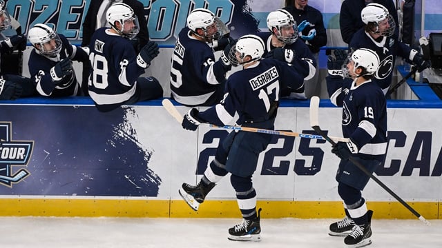 Apr 10, 2025; St. Louis, Missouri, UNITED STATES; Penn State Nittany Lions forward Nicholas DeGraves (17) celebrates with teammates after scoring a goal against the Boston University Terriers during the third period of the Frozen Four college ice hockey national semifinals at Enterprise Center. Mandatory Credit: Connor Hamilton-Imagn Images