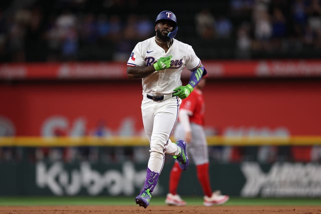 ARLINGTON, TEXAS - AUGUST 27: Adolis García #53 of the Texas Rangers celebrates as he runs the bases on his three run home run during the first inning against the Los Angeles Angels at Globe Life Field on August 27, 2025 in Arlington, Texas.