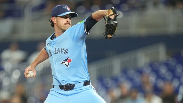 Aug 22, 2025; Miami, Florida, USA; Toronto Blue Jays starting pitcher Shane Bieber (57) throws a pitch against the Miami Marlins at loanDepot Park. Mandatory Credit: Jim Rassol-Imagn Images