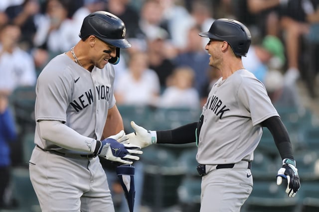 CHICAGO, ILLINOIS - AUGUST 28: Cody Bellinger #35 of the New York Yankees celebrates with Aaron Judge #99 after hitting a two-run home run off Davis Martin #65 of the Chicago White Sox (not pictured) during the first inning at Rate Field on August 28, 2025 in Chicago, Illinois.