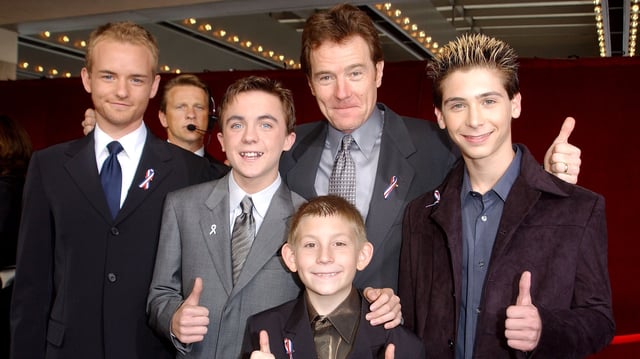 396787 23: The cast of "Malcolm In The Middle" give a thumbs up sign at the 53rd Annual Primetime Emmy Awards at the Shubert Theater November 4, 2001 in Los Angeles, CA. (L-R) Actors Christopher Masterson, Frankie Muniz, Erik Per Sullivan (front center), Bryan Cranston and Justin Berfield. (Photo by Vince Bucci/Getty Images)