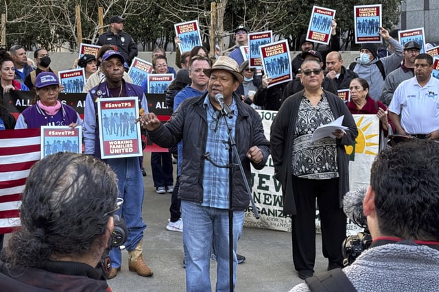 FILE - Immigrant rights supporters hold a rally in front of the federal courthouse in San Francisco, on Monday, March 24, 2025, ahead of a hearing for a lawsuit against the Trump administration. (AP Photo/Terry Chea, File)