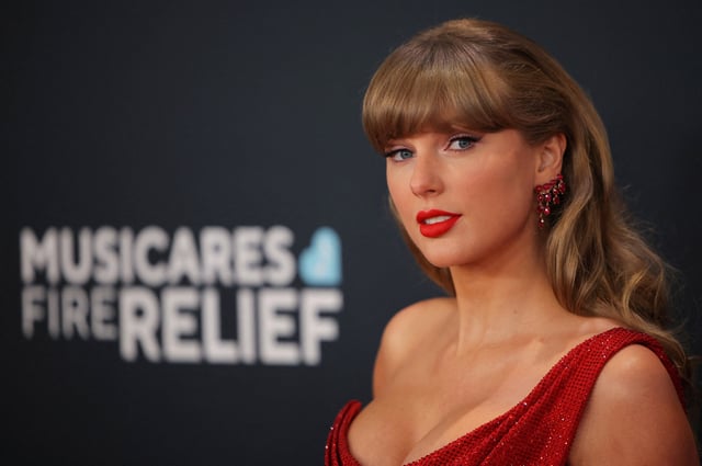 Taylor Swift poses at the red carpet during the 67th Annual Grammy Awards in Los Angeles, California, U.S., February 2, 2025. REUTERS/Daniel Cole/File Photo