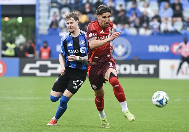 Toronto FC's Theo Corbeanu (7) breaks away from CF Montreal's Dawid Bugaj (27) during second half MLS soccer action in Montreal, Saturday, May 17, 2025. THE CANADIAN PRESS/Graham Hughes