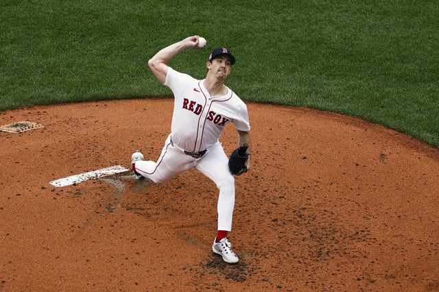 BOSTON, MASSACHUSETTS - JULY 27 : Walker Buehler #0 of the Boston Red Sox pitches against the Los Angeles Dodgers during the game at Fenway Park on July 27, 2025 in Boston, Massachusetts.