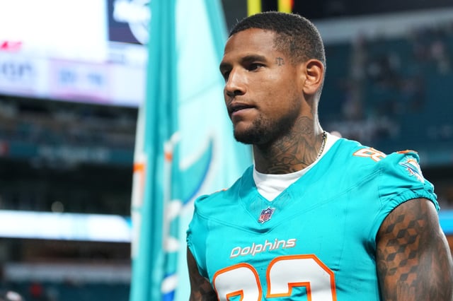 MIAMI GARDENS, FLORIDA - AUGUST 23: Darren Waller #83 of the Miami Dolphins leaves the field at the end of the NFL Preseason 2025 game between Jacksonville Jaguars and Miami Dolphins at Hard Rock Stadium on August 23, 2025 in Miami Gardens, Florida.