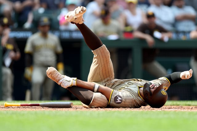 SEATTLE, WASHINGTON – AUGUST 27: Xander Bogaerts #2 of the San Diego Padres reacts after he fouled a ball off his ankle during the eighth inning against the Seattle Mariners at T-Mobile Park on August 27, 2025 in Seattle, Washington. (Photo by Steph Chambers/Getty Images)