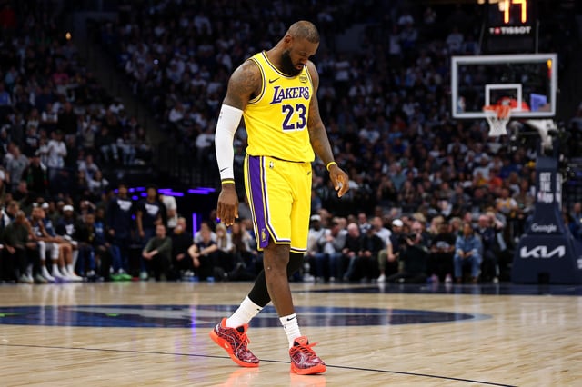 MINNEAPOLIS, MINNESOTA - APRIL 25: LeBron James #23 of the Los Angeles Lakers looks on against the Minnesota Timberwolves in the first quarter of Game Three of the First Round of the 2025 NBA Playoffs at Target Center on April 25, 2025 in Minneapolis, Minnesota. The Timberwolves defeated the Lakers 116-104 to take a 2-1 series lead.
