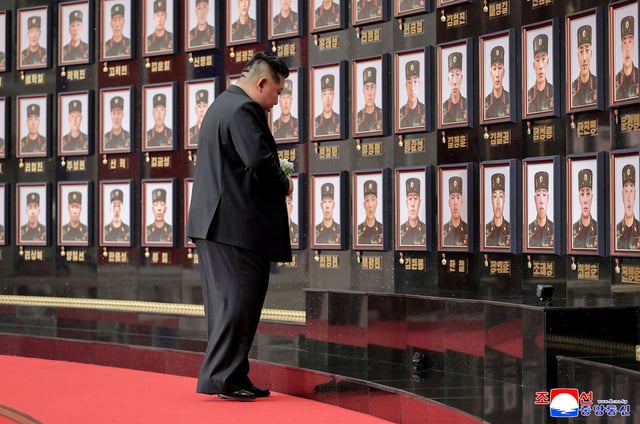 North Korean leader Kim Jong pays homage to the soldiers killed during operations as he attends a national commendation ceremony for the commanders and fighters of the Korean People's Army's overseas operations unit, at  the headquarters of the Central Committee of the Korean Workers' Party,  in Pyongyang, North Korea, in this photo released on August 22, 2025 by North Korea's Korean Central News Agency (KCNA). KCNA via REUTERS/ File Photo