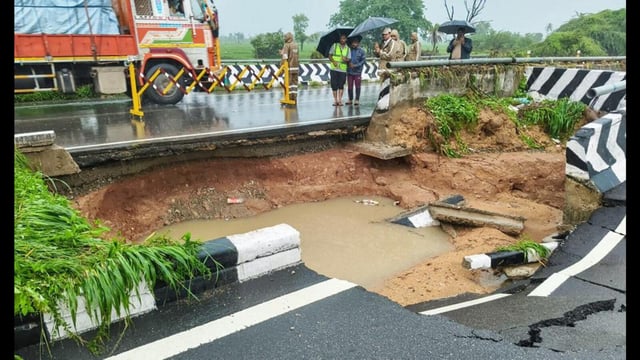 Certain stretches of National Highway-44 in Kamareddy district have been damaged due to intense rainfall in Telangana on Thursday. (Agencies)