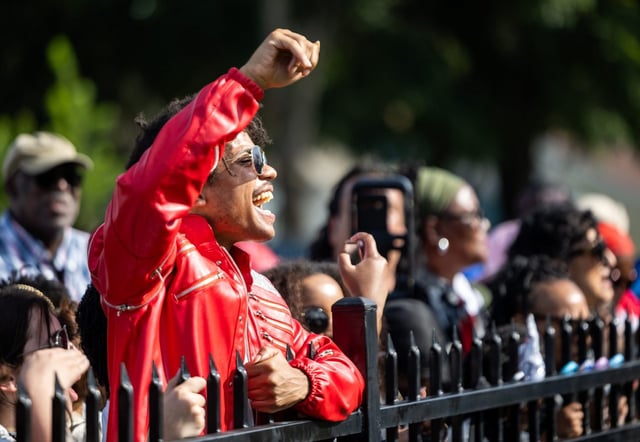 Michael Jackson fan Chris Lopez sings to Jackson’s music during a press conference at the inaugural 2300 Jackson Street Block Party on Aug. 29, 2025, at Jackson’s childhood home in Gary, Indiana. “I cannot dance like Mike,” Lopez said. “I wish I could [but] I couldn’t do it justice.” (Dominic Di Palermo/Chicago Tribune)
