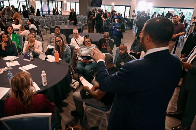 May 6, 2025: Deputy Mayor Justin Williams, right, leads a breakout group discussion on Equitable Neighborhood Development during the in-person FY26 Preliminary Budget Town Hall at Coppin State University. (Kenneth K. Lam/Staff)