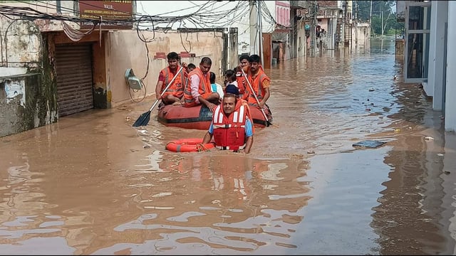 Stranded residents being rescued in Ambala on Friday. (HT)
