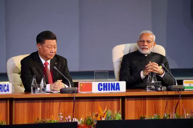 Indian Prime Minister Narendra Modi and China's President Xi Jinping attend the BRICS summit meeting in Johannesburg, South Africa, July 27, 2018.
