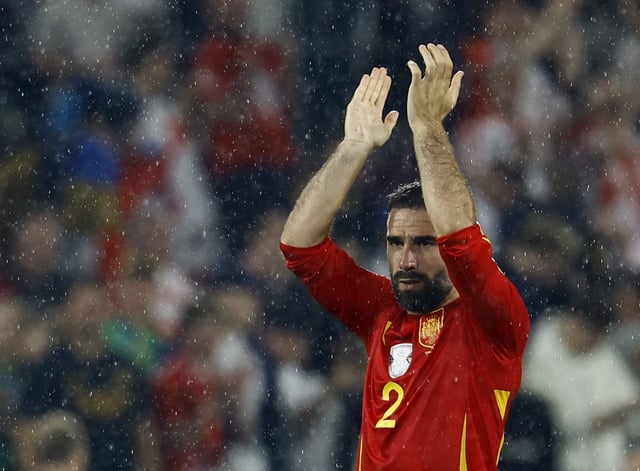 Soccer Football - Euro 2024 - Round of 16 - Spain v Georgia - Cologne Stadium, Cologne, Germany - June 30, 2024 Spain's Dani Carvajal applauds fans after the match REUTERS/Wolfgang Rattay/ File Photo