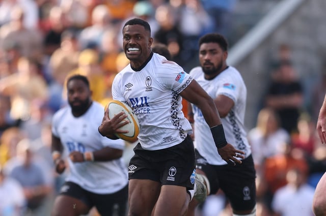 NEWCASTLE, AUSTRALIA - JULY 06: Jiuta Wainiqolo of Fiji makes a break during the International Test match between Australia Wallabies and Fiji at McDonald Jones Stadium on July 06, 2025 in Newcastle, Australia. (Photo by Scott Gardiner/Getty Images)