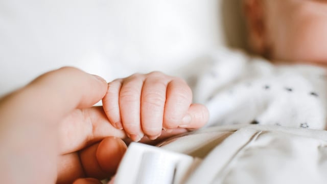 The couple was in their RV early Wednesday when Kayla woke up with severe abdominal pain. Within minutes, she went into labor and delivered Aurora inside their camper in the Nevada desert.