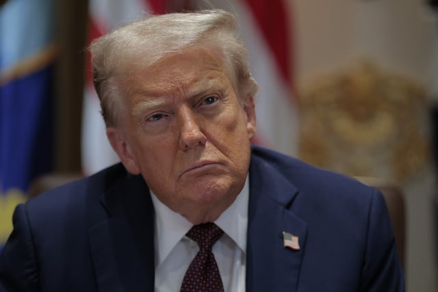 President Donald Trump attends a cabinet meeting at the White House in Washington, D.C. on August 26, 2025.