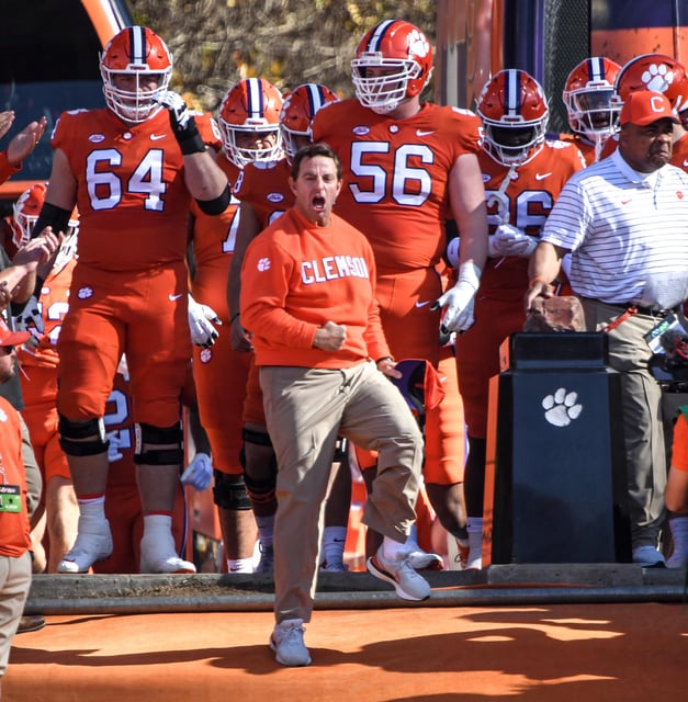 Clemson head coach Dabo Swinney gets ready to run down the hill at Howard's Rock before kickoff with South Carolina at Memorial Stadium in Clemson, South Carolina Saturday, Nov. 26, 2022.
